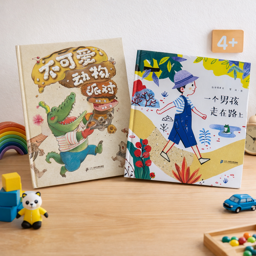 Two children's books on a wooden surface with toys and a calendar in the background.